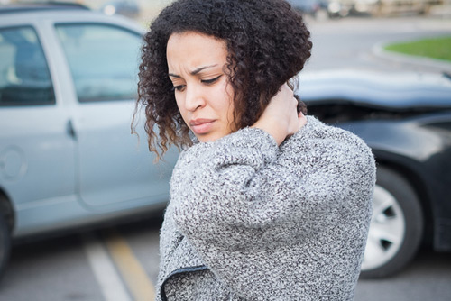 Woman in car Accident with Neck Injury